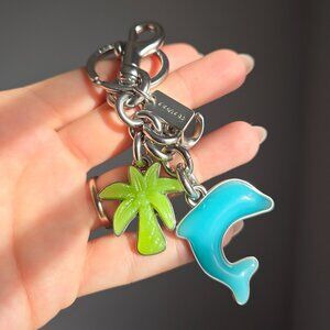 Coach dolphin and palm tree cluster bag charm